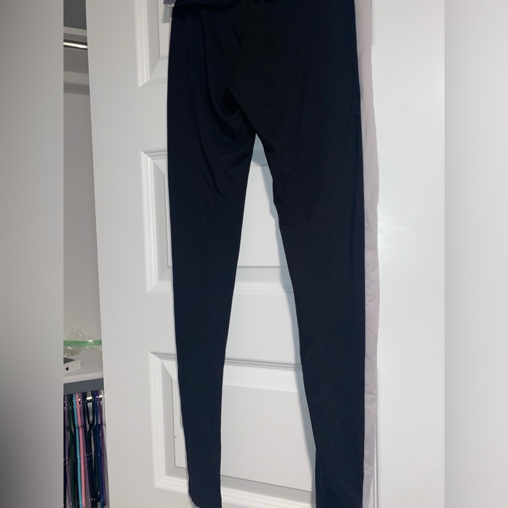 leggings with white stripe on both sides. medium